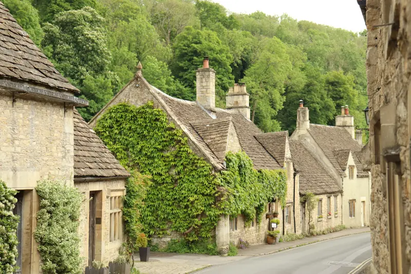 A row of stone cottages in a Cotswold village